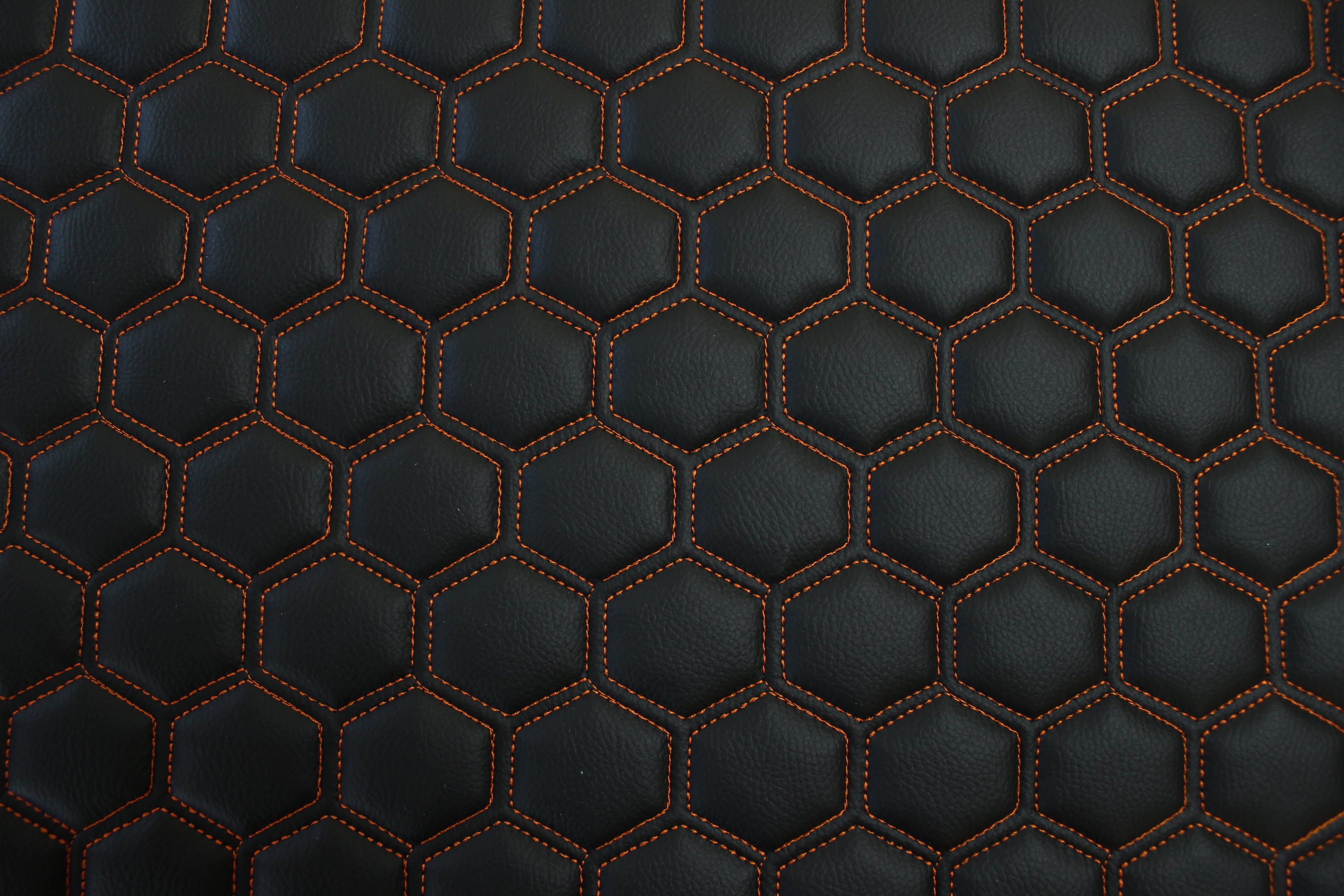 Orange Quilted Black Vinyl Faux Leather Car Upholstery Fabric | 2" x 5cm Hexagon Pattern Stitch with 5mm Foam Backing | 140cm Wide | Automotive