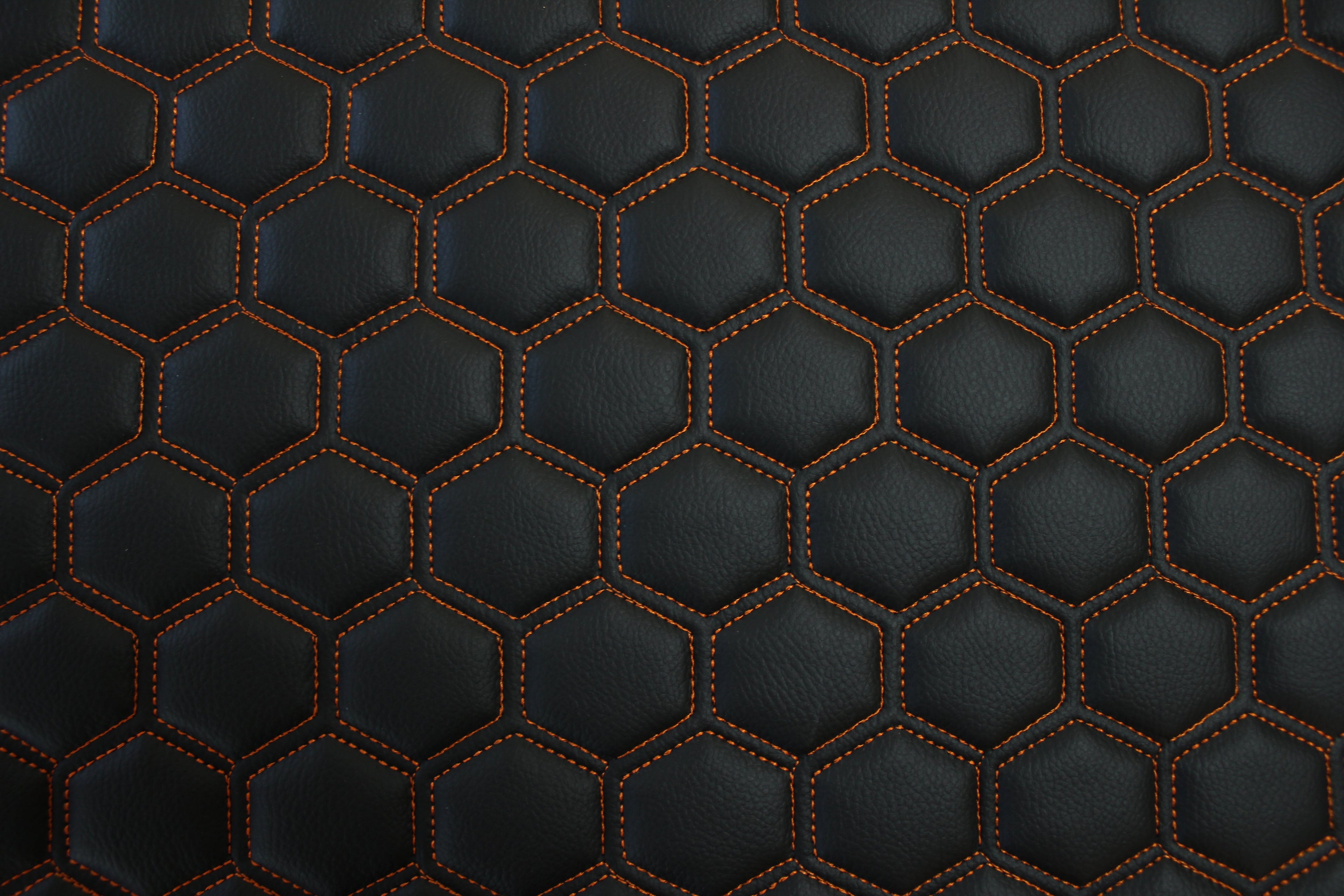 Orange Quilted Black Vinyl Faux Leather Car Upholstery Fabric | 2" x 5cm Hexagon Pattern Stitch with 5mm Foam Backing | 140cm Wide | Automotive