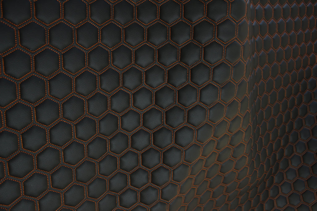 Orange Quilted Black Vinyl Faux Leather Car Upholstery Fabric | 2" x 5cm Hexagon Pattern Stitch with 5mm Foam Backing | 140cm Wide | Automotive