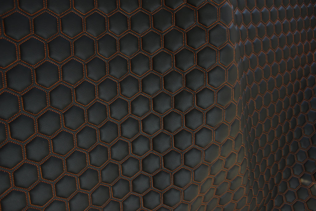 Orange Quilted Black Vinyl Faux Leather Car Upholstery Fabric | 2" x 5cm Hexagon Pattern Stitch with 5mm Foam Backing | 140cm Wide | Automotive