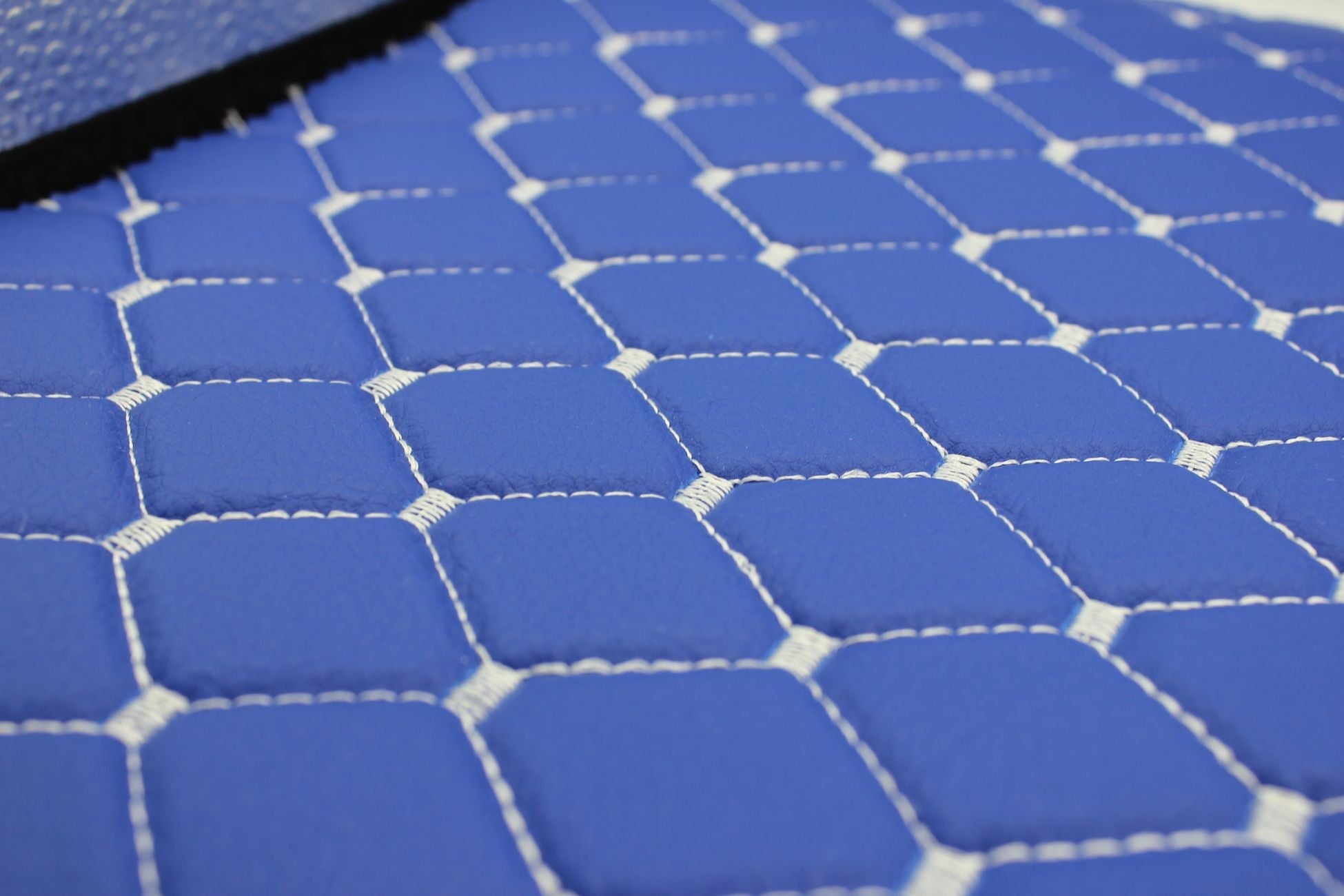 white-quilted-blue-faux-leather-upholstery-fabric-diamond