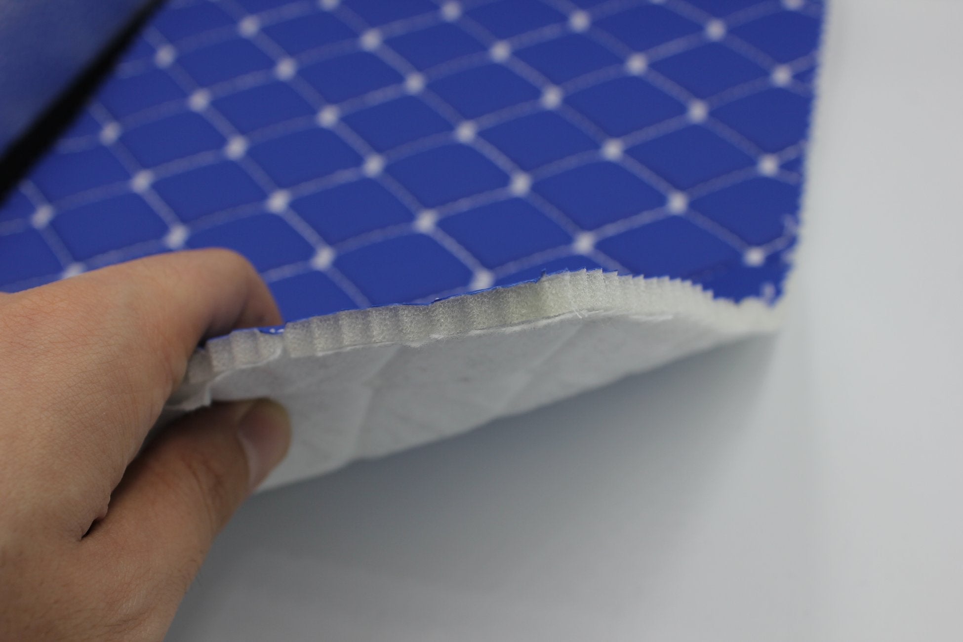 white-quilted-blue-faux-leather-upholstery-fabric-diamond